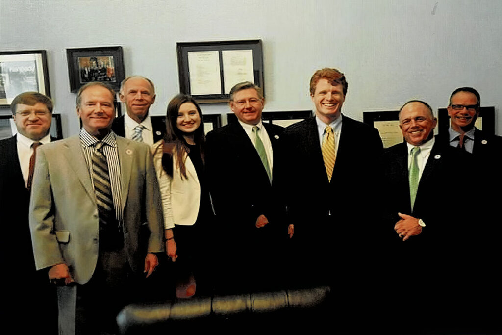 A Legislative Fly In meeting in Washington D.C. (L-R) Bill Weber, ArborWear; Steve Marshall, Davey; Daniel Van Starrenburg, SavATree; Anne Garvin; Mark Garvin; U.S. Rep. Patrick Kennedy; Andy Felix, Tree Tech; Ben Tresselt, Arborist Enterprises. Source: Mark Garvin