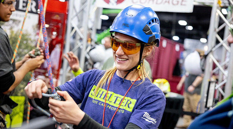 An arborist giving a knot tying demonstration at ArborEXPO.