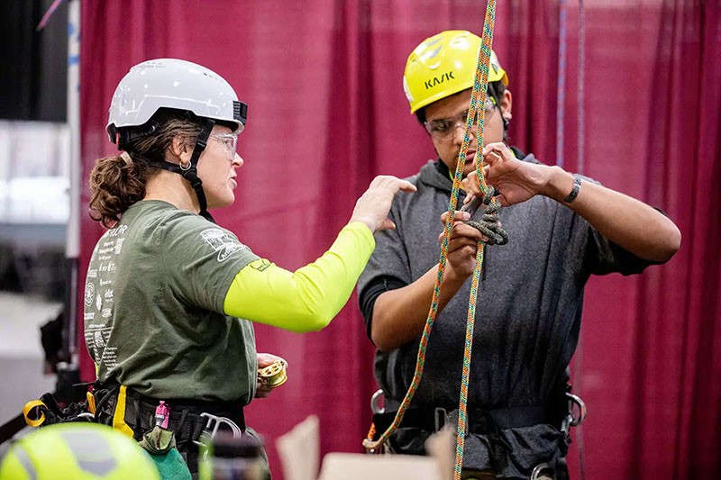 Arborists train with advanced climbing methods, setting the stage for the dynamic challenges coming to ArborSPORTS. Source: Joe Tacynec