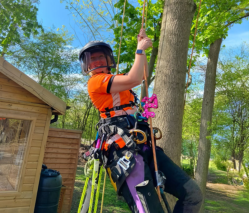 Emily Allison suits up in chainsaw-rated trousers and a harness – proof that comfort and safety go hand-in-hand in arboriculture. Source: Emily Allison