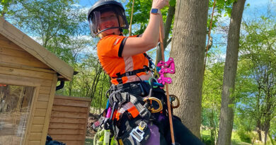 Emily Allison suits up in chainsaw-rated trousers and a harness – proof that comfort and safety go hand-in-hand in arboriculture. Source: Emily Allison