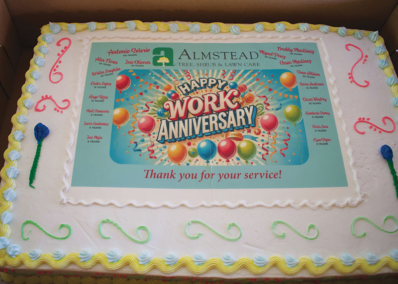 A special cake with the names and years of service of all the award recipients was cut and served in their honor.